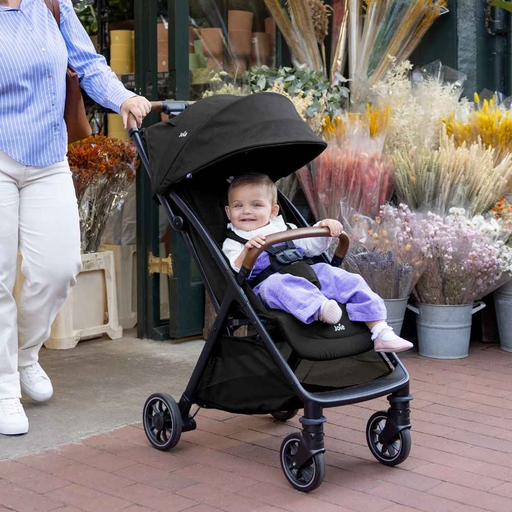 Stroller is really lightweight and the basket is amazingly large. It is cabin approved and amazing to travel with. Very easy to assemble — very easy to lock and unlock.